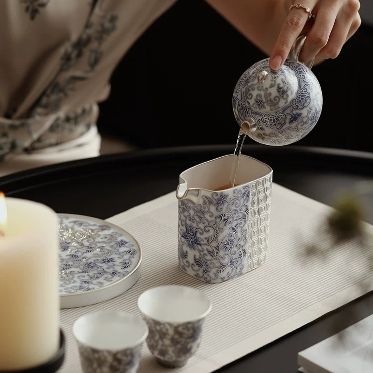 Fourfold Fortune | Handcrafted Silver-Detailed Porcelain Tea Pitcher