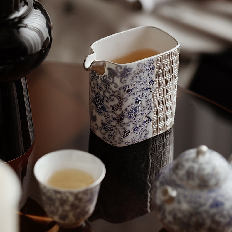 Fourfold Fortune | Handcrafted Silver-Detailed Porcelain Tea Pitcher
